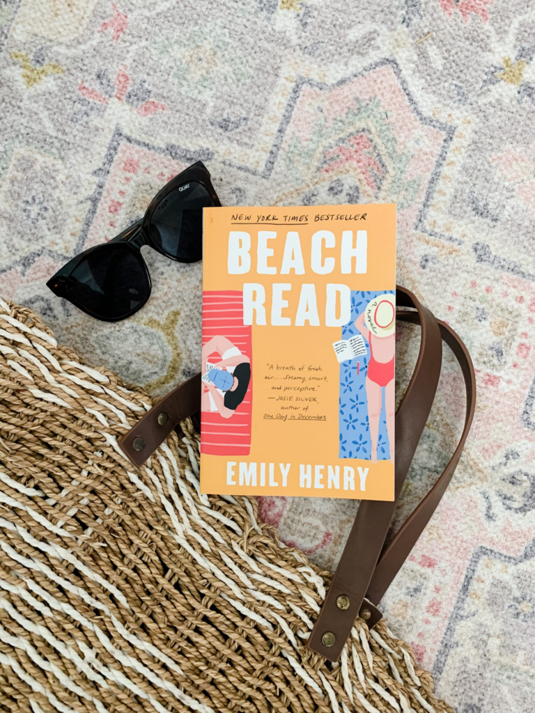 Book near beach bag and goggles